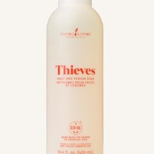Young Living Thieves Produce Cleaner in White and Red